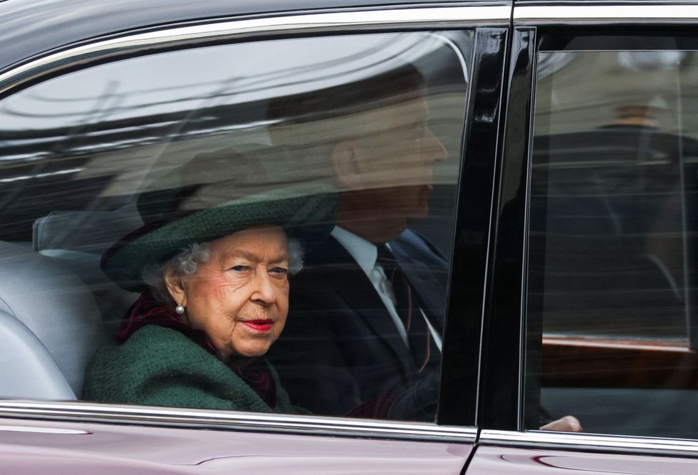 Britain's Queen Elizabeth and Prince Andrew, Duke of York, arrive for the service of thanksgiving for late Prince Philip, Duke of Edinburgh, at Westminster Abbey, in London, Britain, March 29, 2022. REUTERS/Tom Nicholson