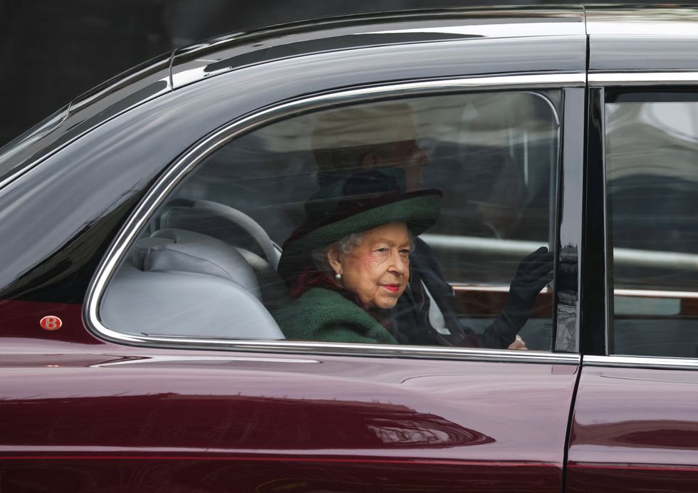 Britain's Queen Elizabeth and Prince Andrew, Duke of York, arrive for the service of thanksgiving for late Prince Philip, Duke of Edinburgh, at Westminster Abbey, in London, Britain, March 29, 2022. REUTERS/Tom Nicholson