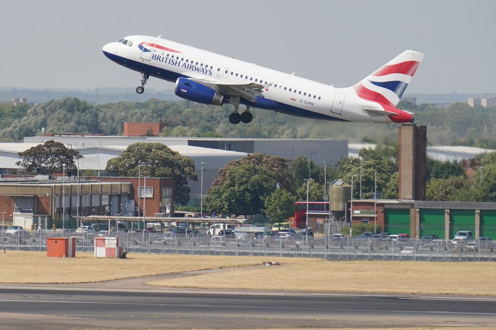 British Airways flight taking off in the heat at Heathrow Airport