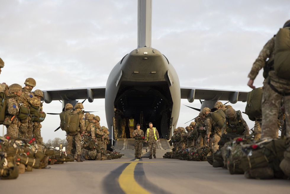 British Army troops load up onto plane