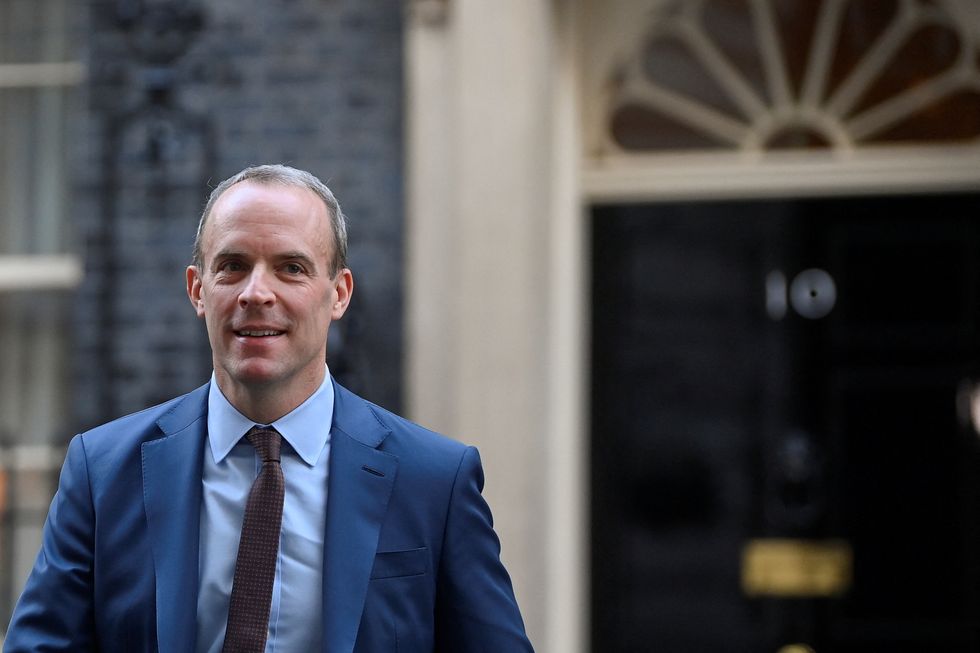 British Deputy Prime Minister and Justice Secretary Dominic Raab walks outside Number 10 Downing Street, in London, Britain, November 22, 2022. REUTERS/Toby Melville