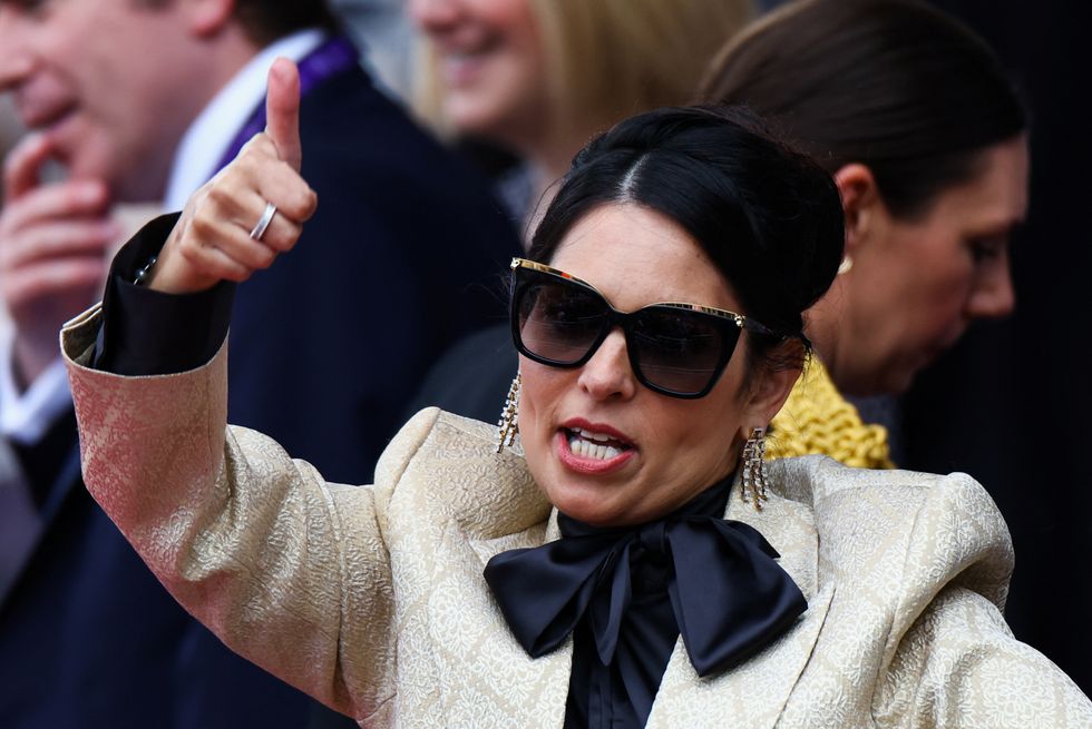 British Home Secretary Priti Patel shows a thumb-up as she attends the BBC Platinum Party at the Palace