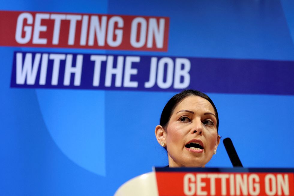 British Home Secretary Priti Patel speaks at the Conservative Party Spring Conference in Blackpool