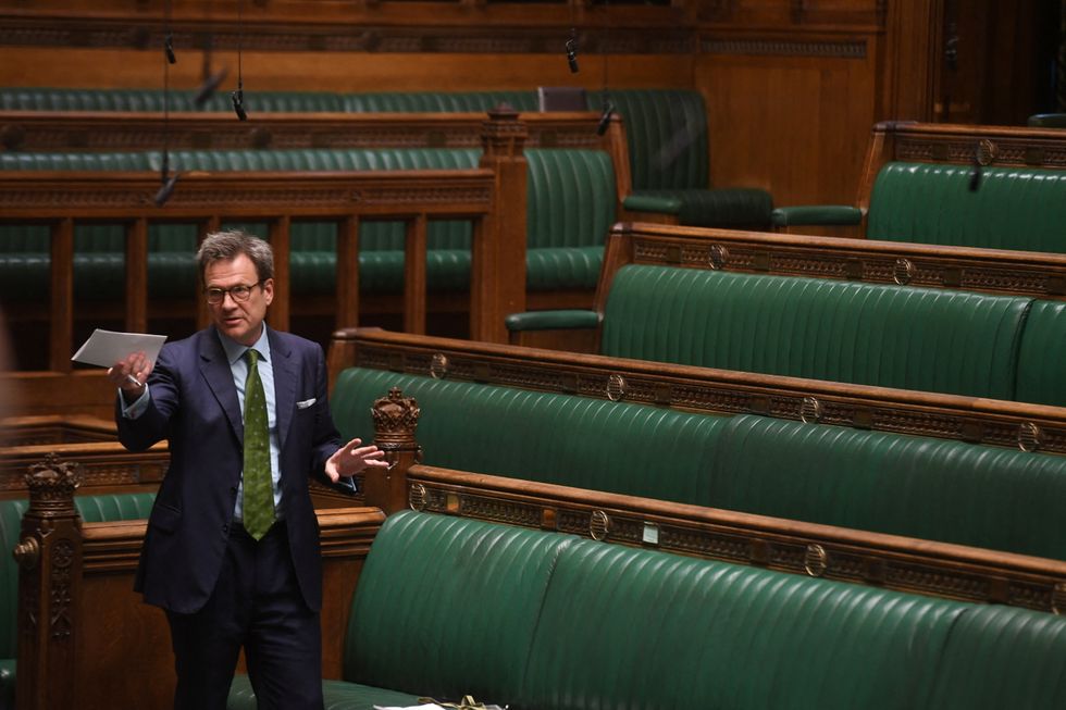 British MP Bob Seely gestures during a meeting on Ukraine following the Russian invasion of Ukraine, at the House of Commons.