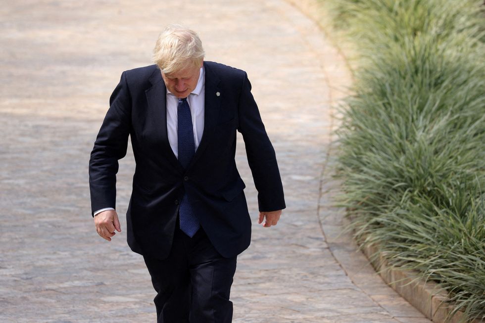 British Prime Minister Boris Johnson arrives for the Leaders' Retreat on the sidelines of the Commonwealth Heads of Government Meeting at Intare Conference Arena in Kigali, Rwanda.