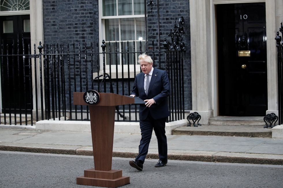 British Prime Minister Boris Johnson arrives to make a statement at Downing Street in London, Britain, July 7, 2022. REUTERS/Peter Nicholls