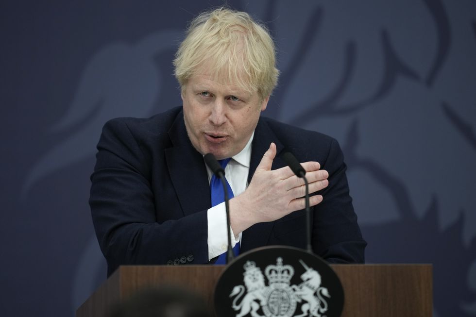 British Prime Minister Boris Johnson delivers a speech to members of the armed services and Maritime and Coastguard Agency at Lydd airport in Kent. Picture date: Thursday April 14, 2022.