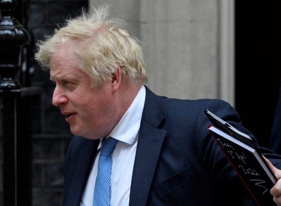 British Prime Minister Boris Johnson departs Downing Street to deliver a statement at the Houses of Parliament, London, Britain, April 19, 2022. REUTERS/Toby Melville