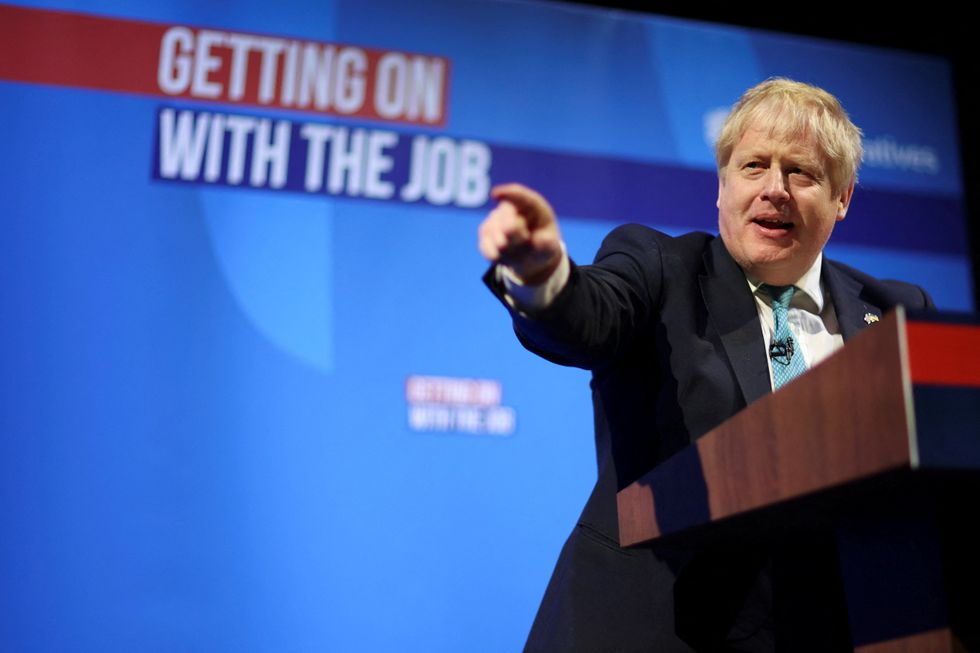 British Prime Minister Boris Johnson gestures during the Conservative Party Spring Conference in Blackpool, Britain March 19, 2022. REUTERS/Phil Noble