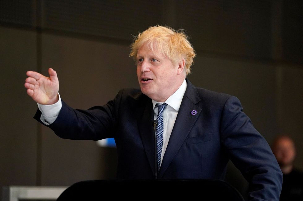 British Prime Minister Boris Johnson gives a speech to mark the completion of London's Crossrail project at Paddington station.