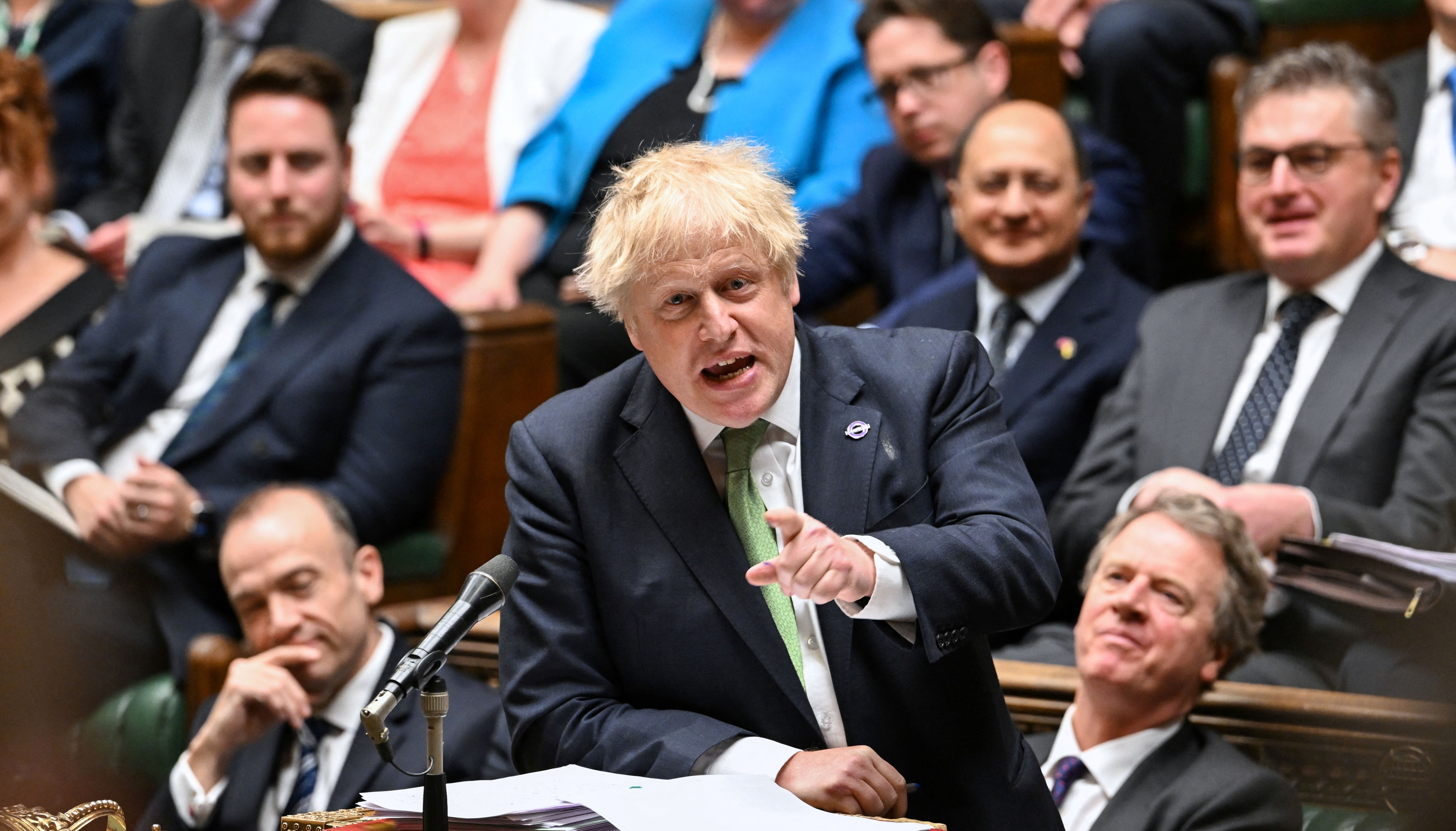 British Prime Minister Boris Johnson speaks as he takes questions at the House of Commons.