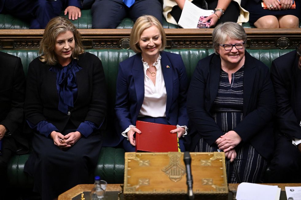 British Prime Minister Liz Truss sits next to Leader of the House of Commons Penny Mordaunt and Health Secretary Therese Coffey as she attends her first Prime Minister's Questions at the House of Commons in London, Britain, September 7, 2022. ?UK Parliament/Jessica Taylor/Handout via REUTERS THIS IMAGE HAS BEEN SUPPLIED BY A THIRD PARTY. MANDATORY CREDIT. IMAGE MUST NOT BE ALTERED
