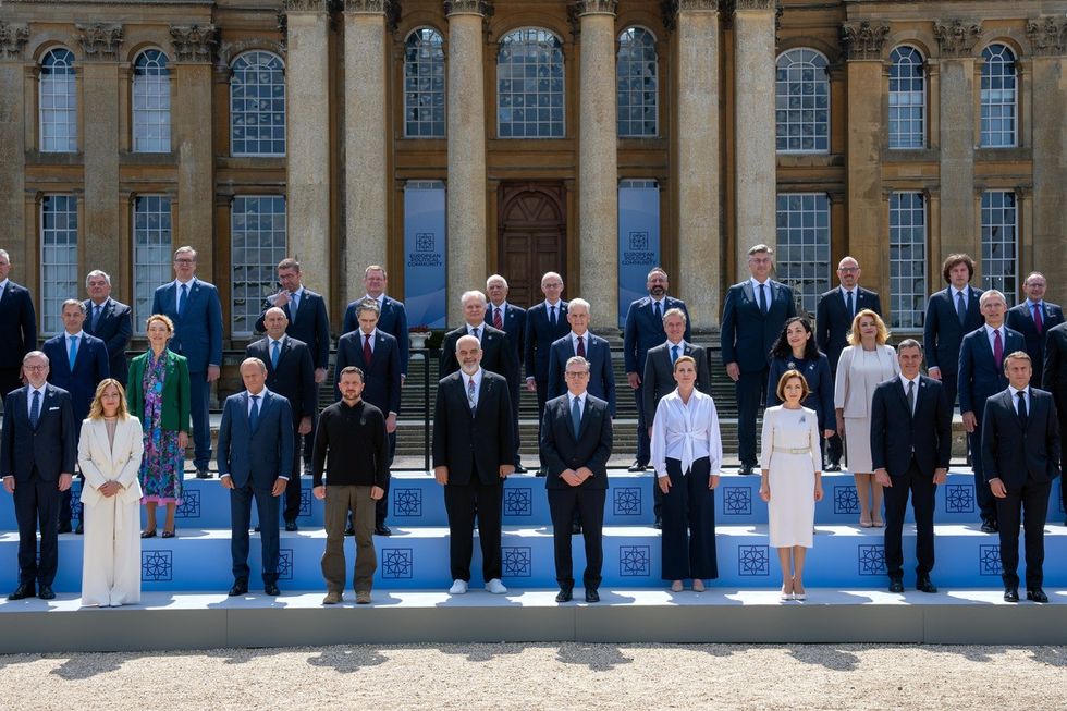 British Prime Minister Sir Keir Starmer (centre) poses for a family photo among European leaders at the European Political Community summit at Blenheim Palace in Woodstock