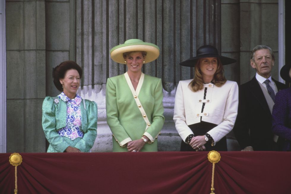 British royals Princess Margaret, Countess of Snowdon (1930-2002), Diana, Princess of Wales (1961-1997), wearing a green and yellow outfit with matching hat, Sarah, Duchess of York, and Sir Angus Ogilvy