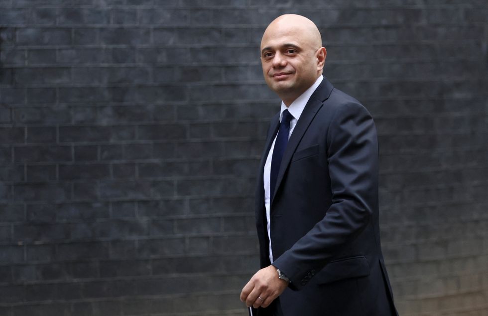 British Secretary of State for Health and Social Care Sajid Javid walks outside Downing Street in London, Britain February 8, 2022. REUTERS/Tom Nicholson