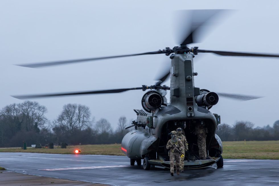 British soldiers exit a Chinook