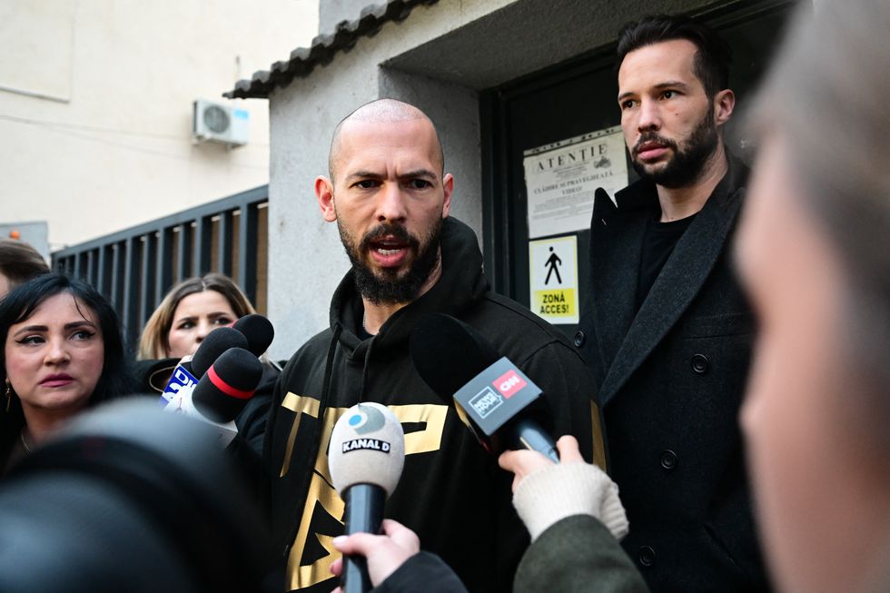 British-US former professional kickboxer and controversial influencer Andrew Tate (C) and his brother Tristan Tate (back R)