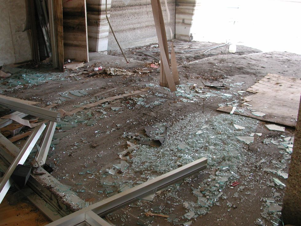 Broken glass on floor (stock)