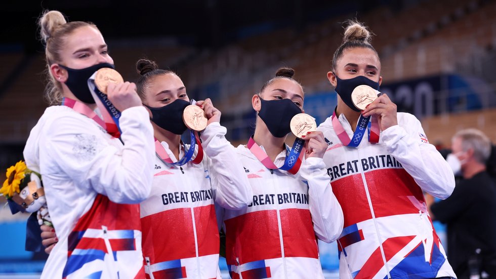 Bronze medalists Jennifer Gadirova of Britain, Jessica Gadirova of Britain, Amelie Morgan of Britain and Alice Kinsella of Britain celebrate on the podium