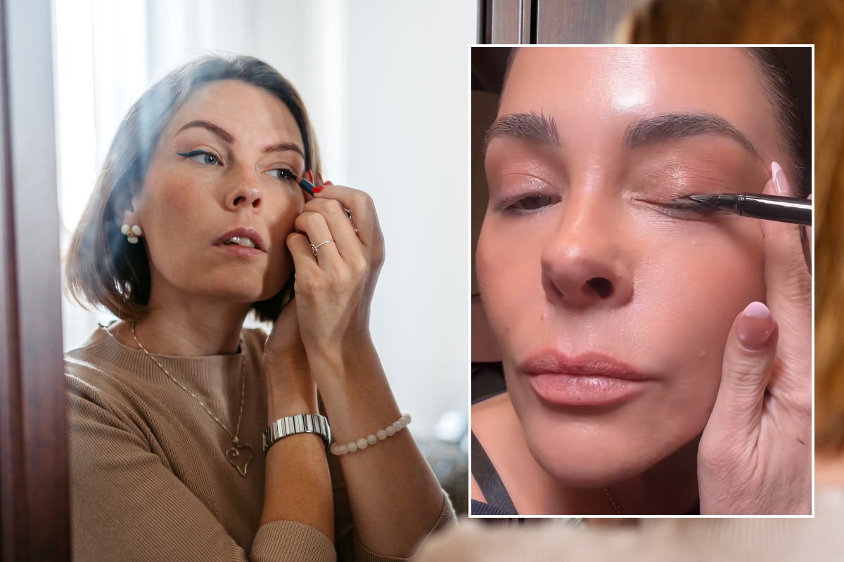 Brunette woman applying eyeliner in the mirror; Erica applying eyeliner