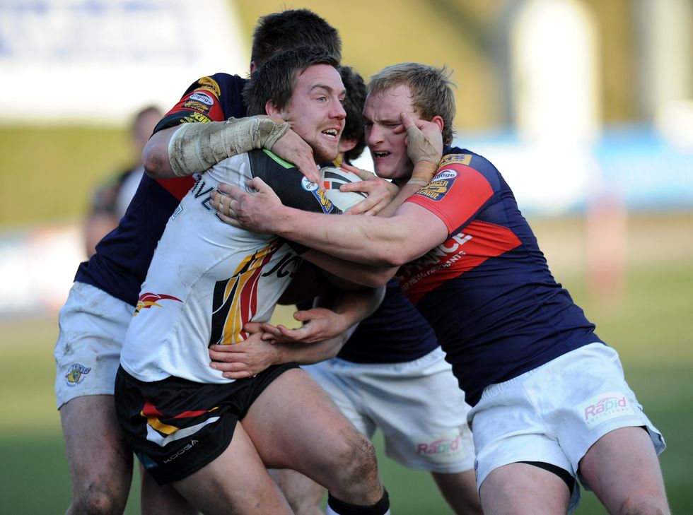 Bryn Hargreaves being tackled