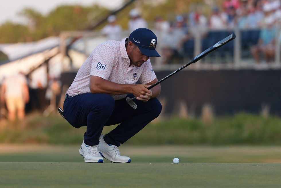 Bryson DeChambeau is using a SIK Pro C-Series arm-lock putter