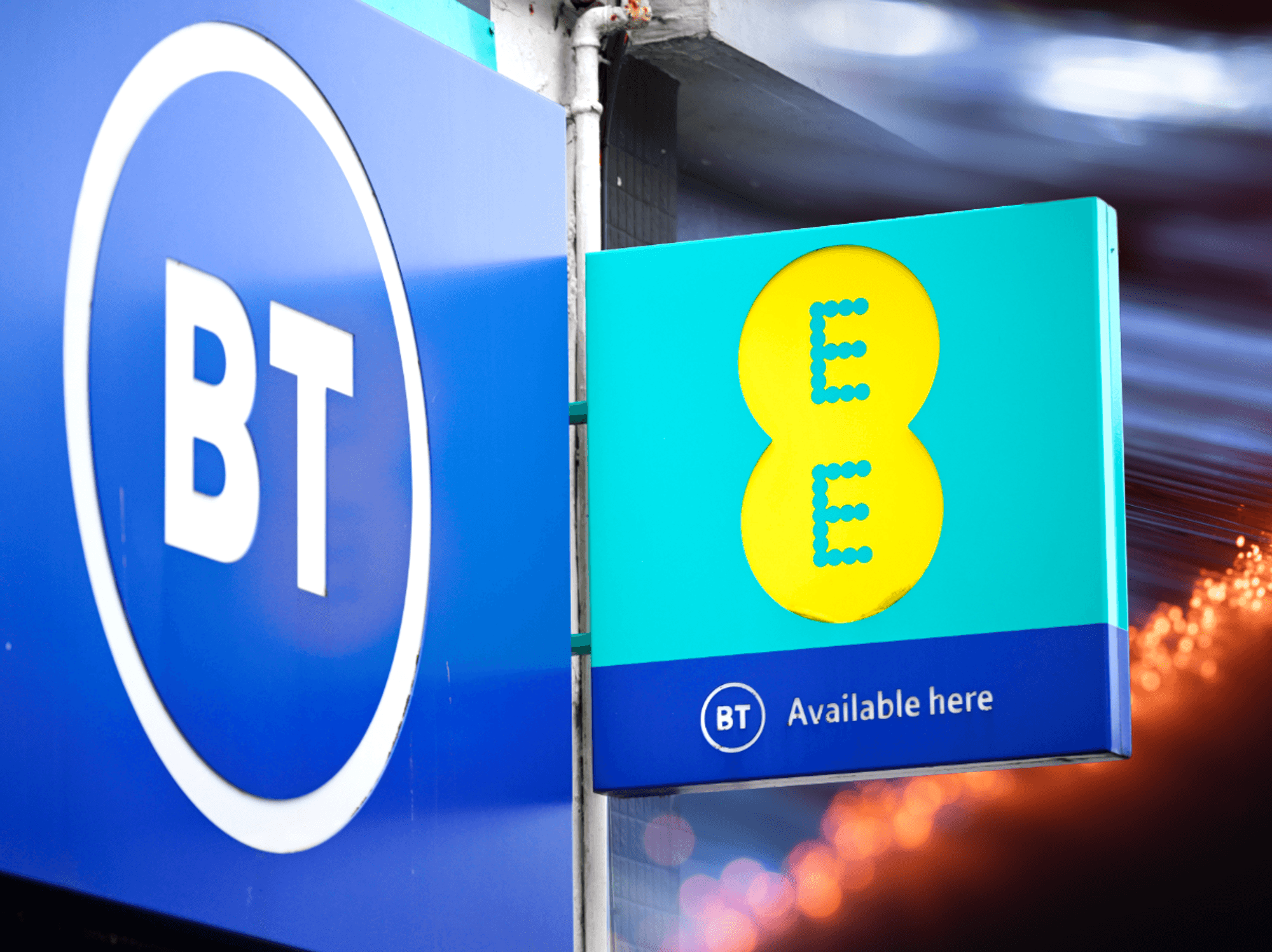 BT and EE logos on a high street store sign with an artists impression of broadband to the side