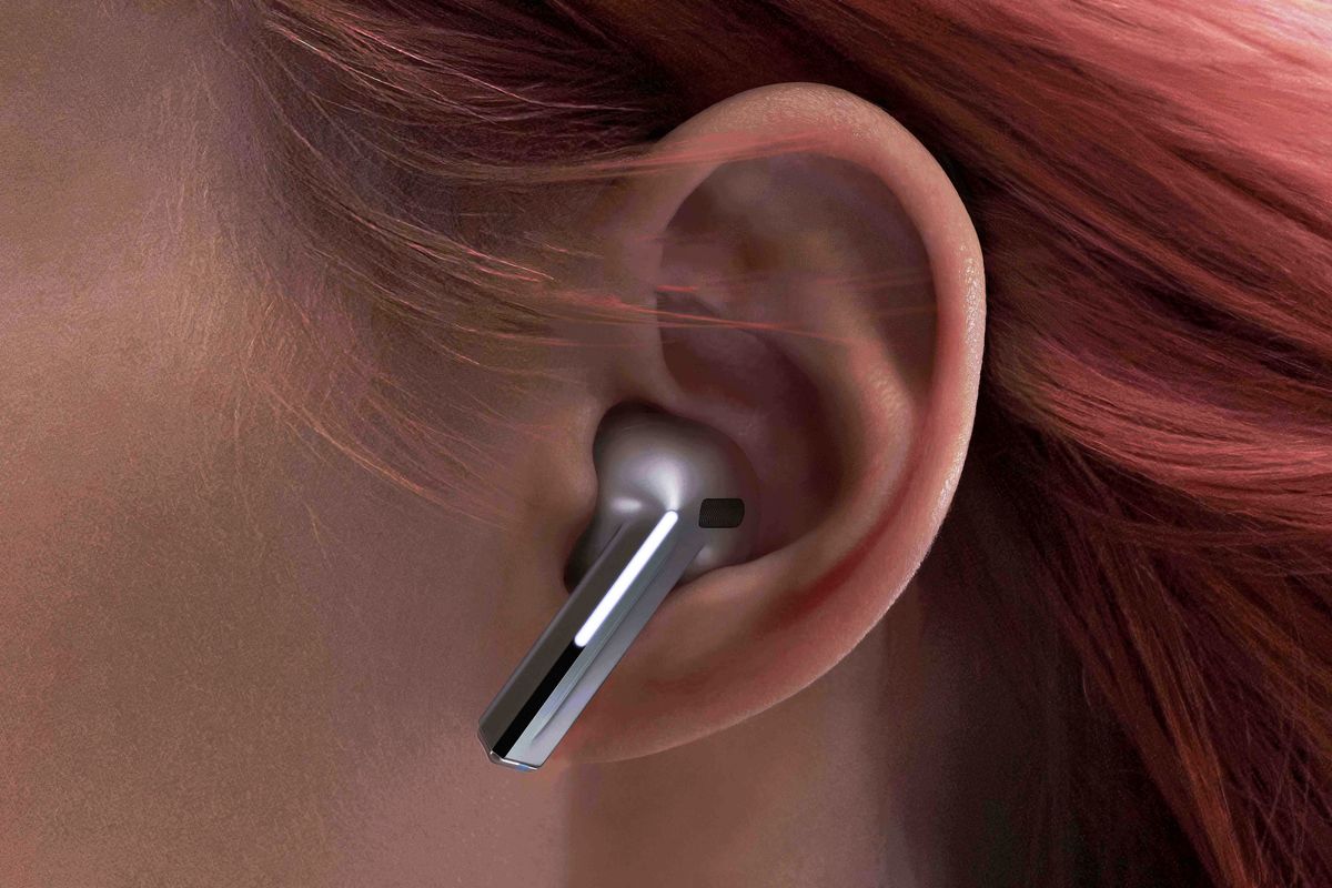 buds 3 pro earbud pictured in a womans ear with red hair