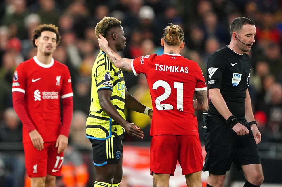 Bukayo Saka apologised to Kostas Tsimikas