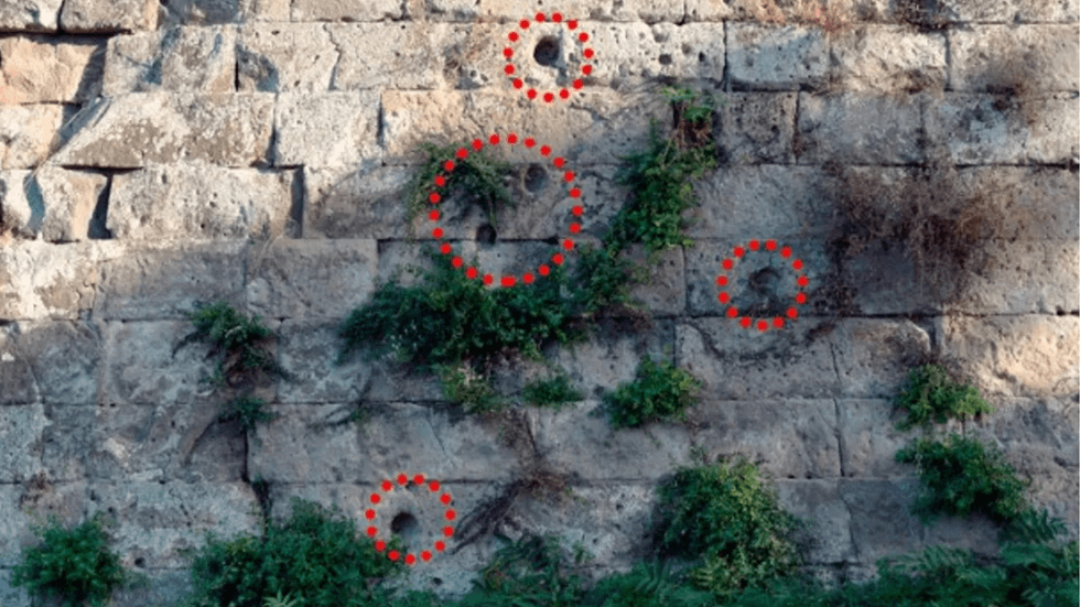 Bullet holes in Pompeii walls