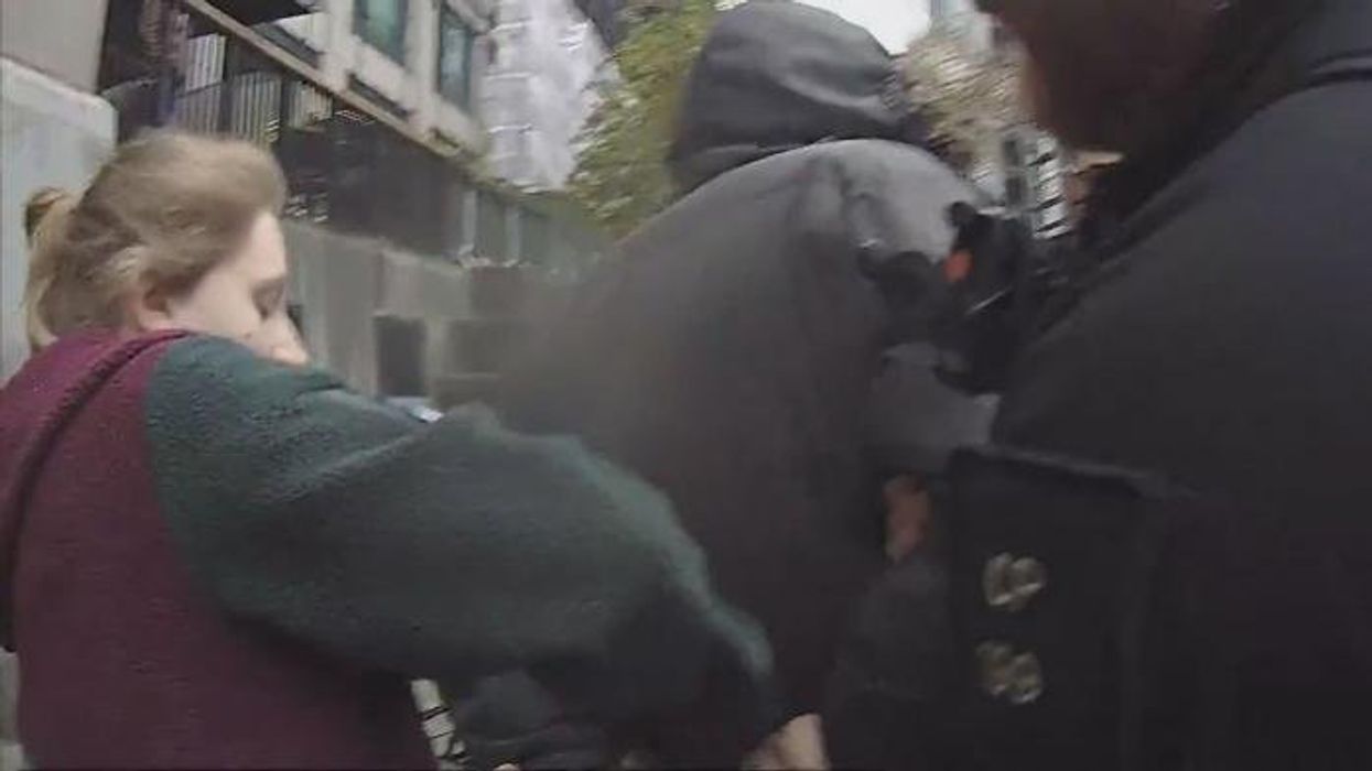 Bungling thieves try to steal bike in broad daylight... directly opposite police station