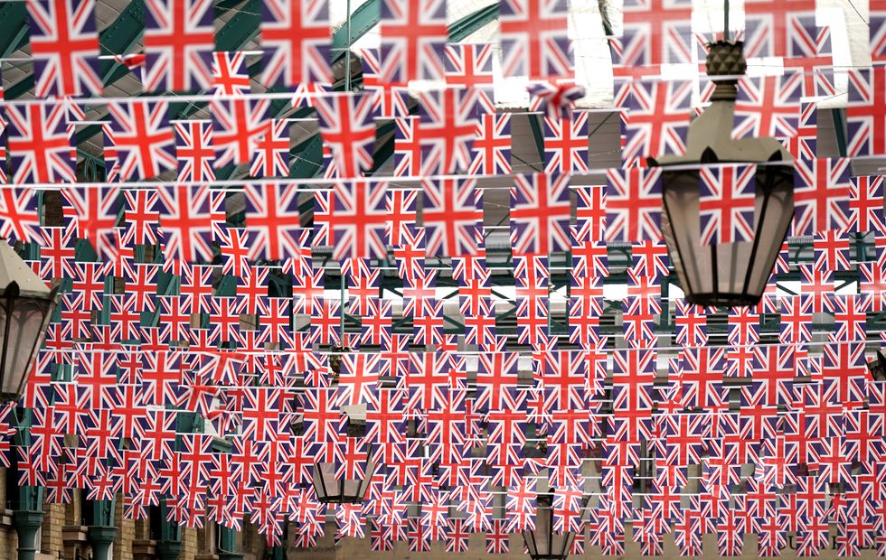 Bunting on display at Covent Garden in central London ahead of the Queen's jubilee celebrations. Picture date: Monday May 30, 2022.