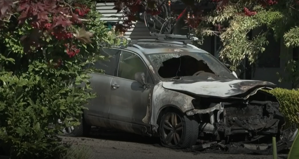 Burnt car neighbour row