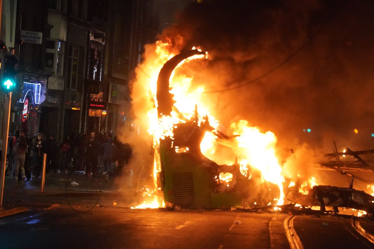 Dublin riots: Violent clashes with police after five injured in knife attack - buses set alight and shops looted