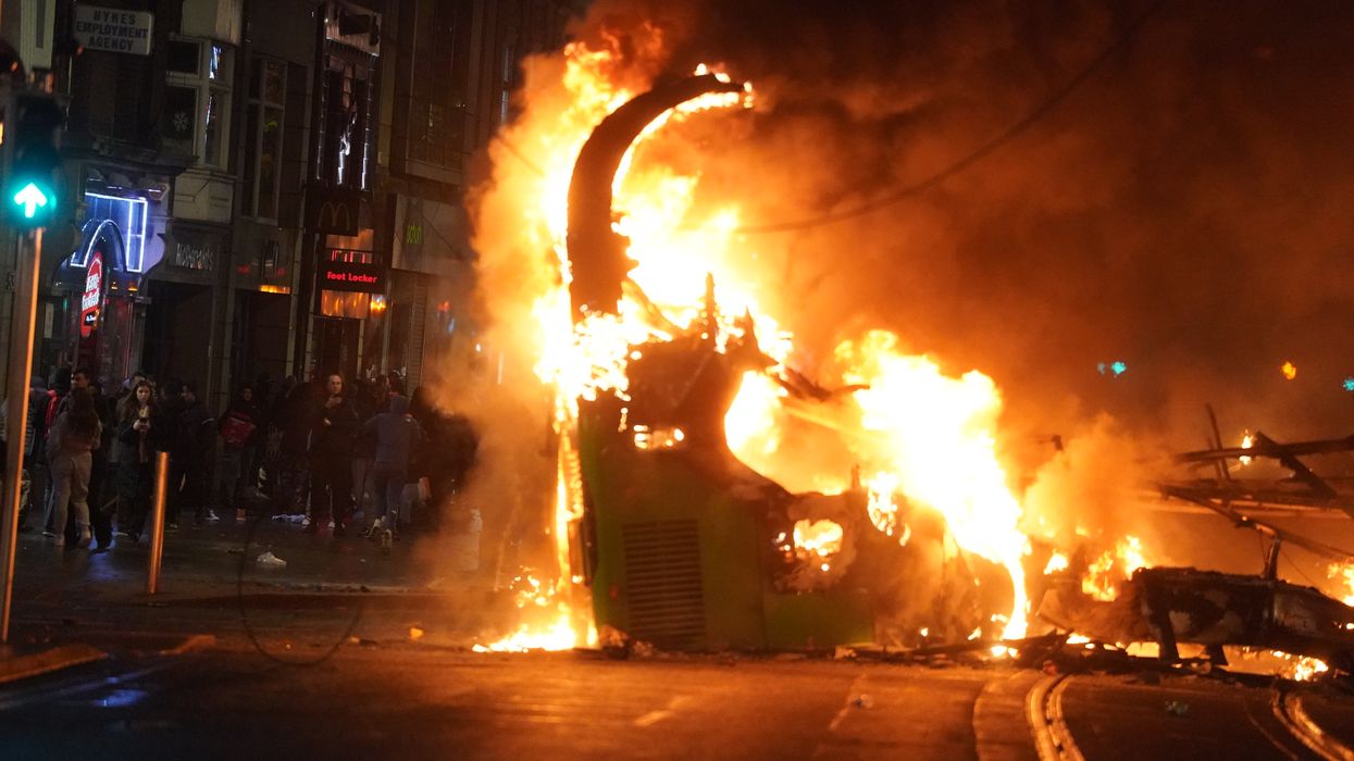Dublin riots: Violent clashes with police after five injured in knife attack - buses set alight and shops looted