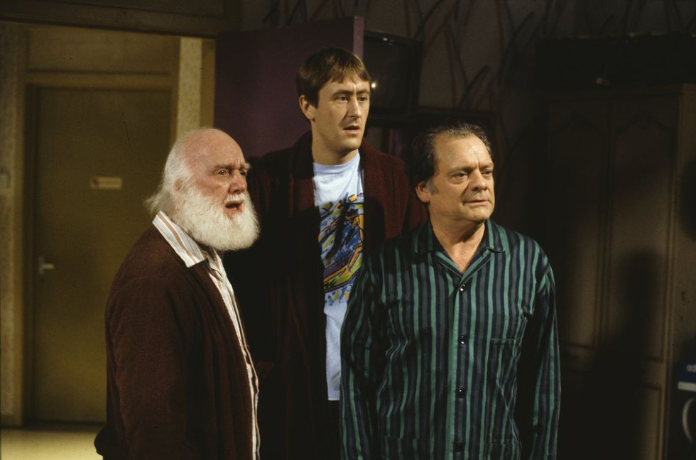 Buster Merryfield (left)