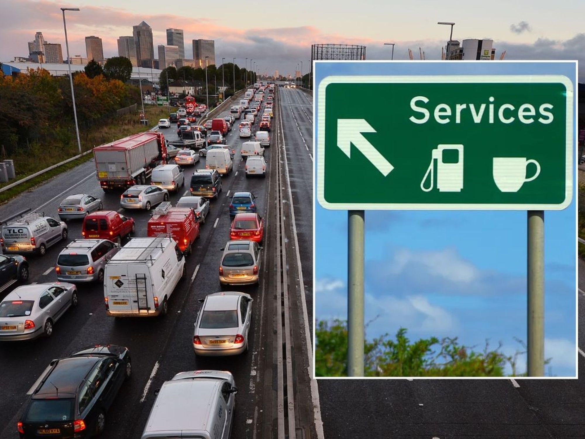 Busy motorway and a motorway service station sign