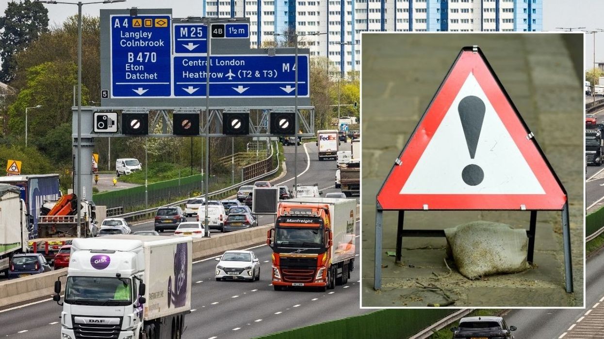 Busy motorway and a warning sign