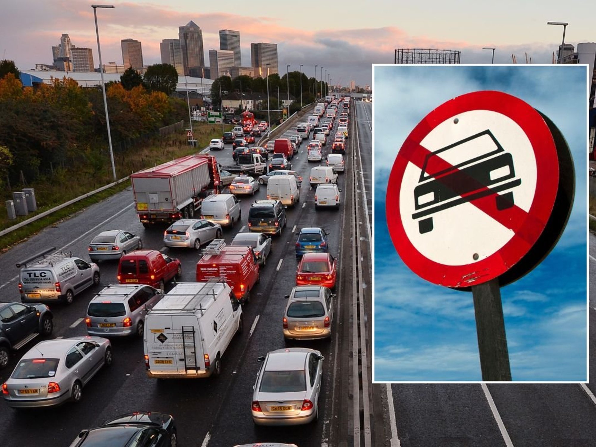 Busy road and a car ban sign