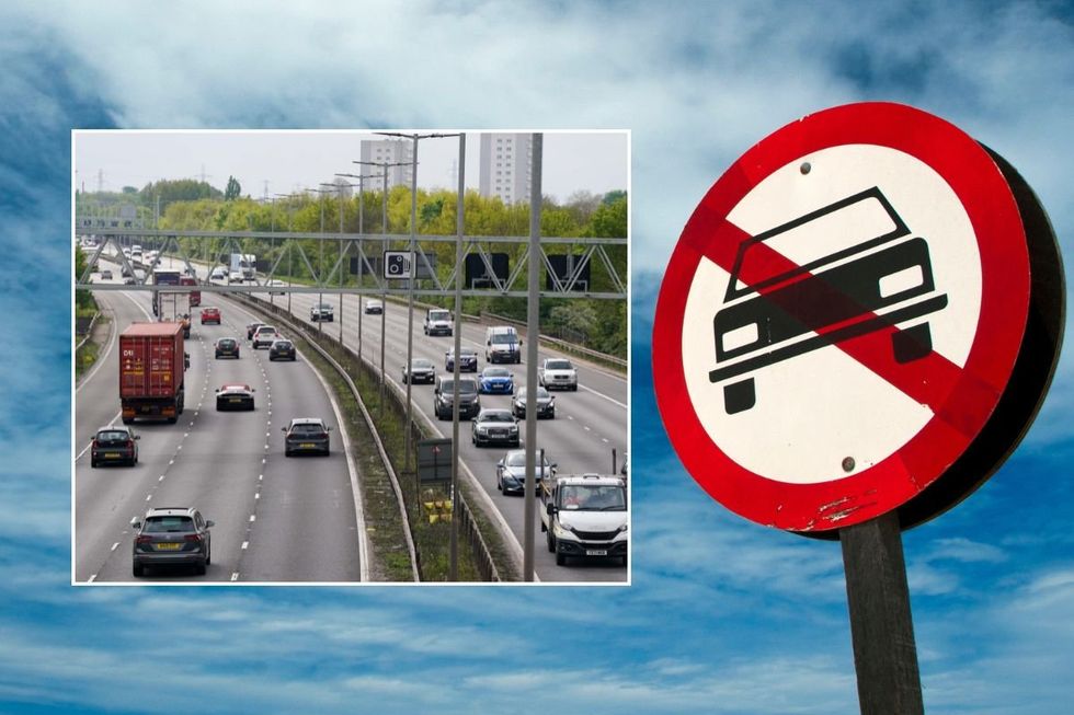 Busy traffic and a car ban sign