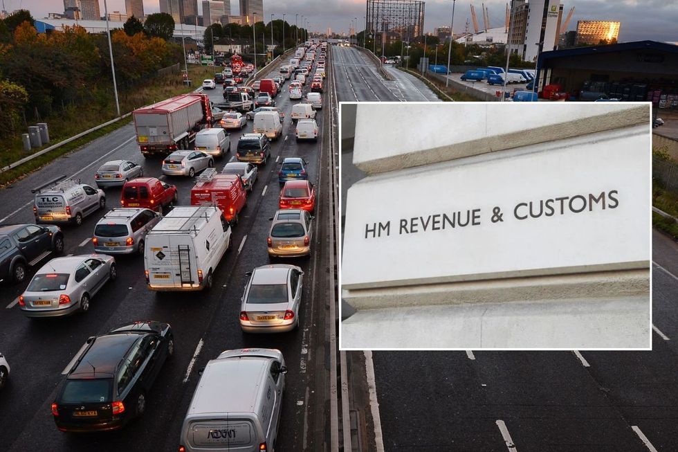 Busy traffic on a road in London and a HMRC sign