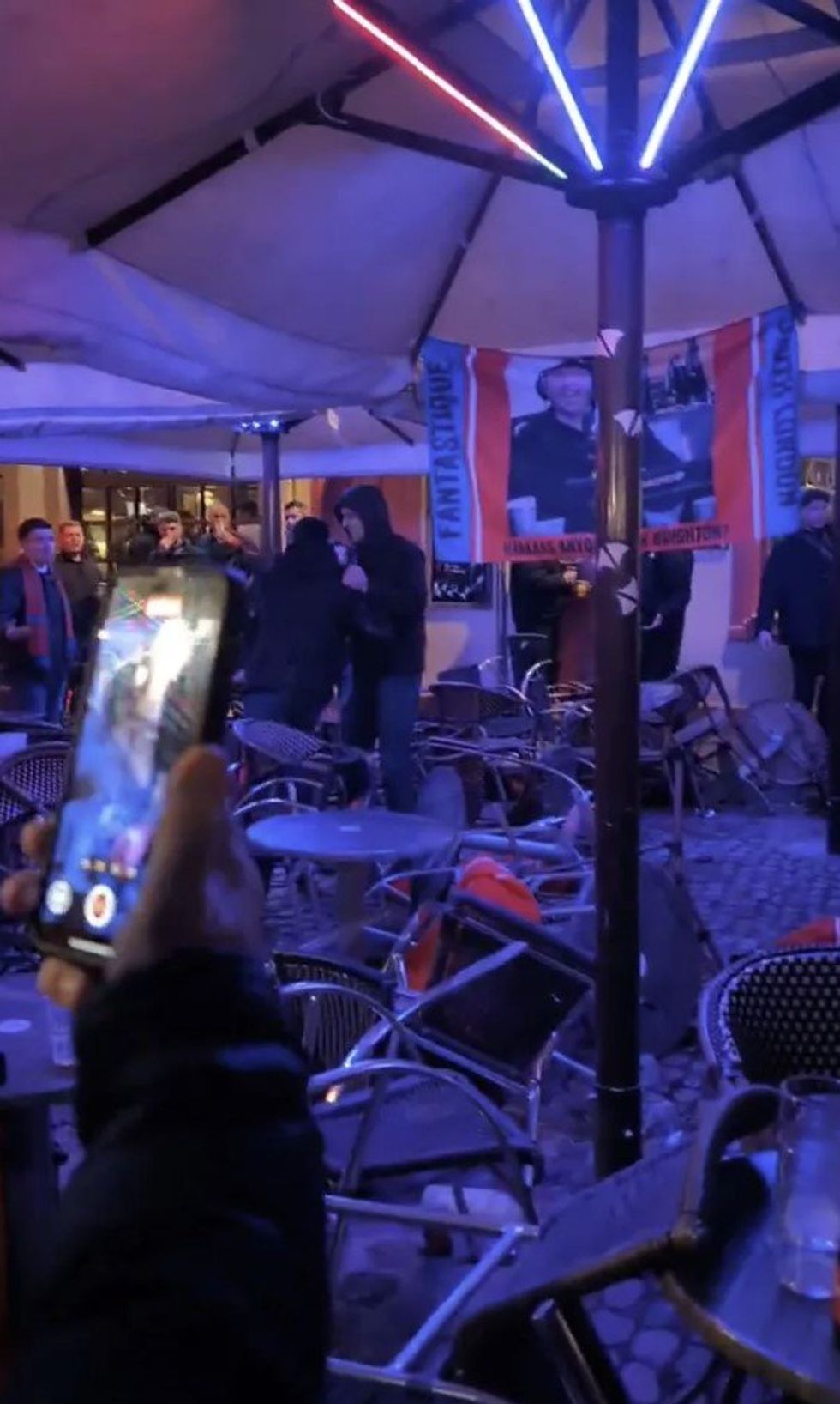 Cafes appeared to be smashed up with glass from windows on the floor and chairs thrown