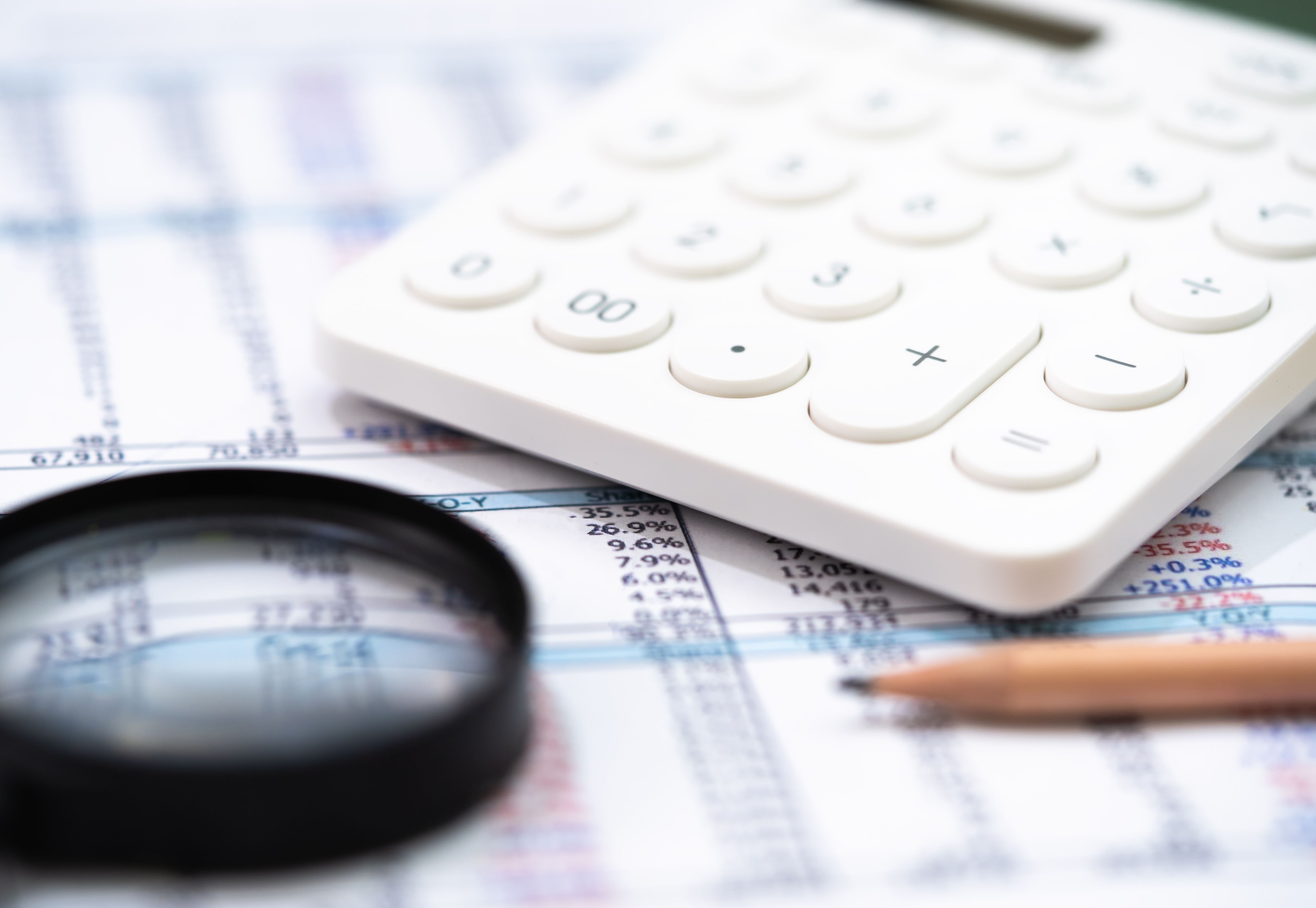 Calculator and magnifying glass