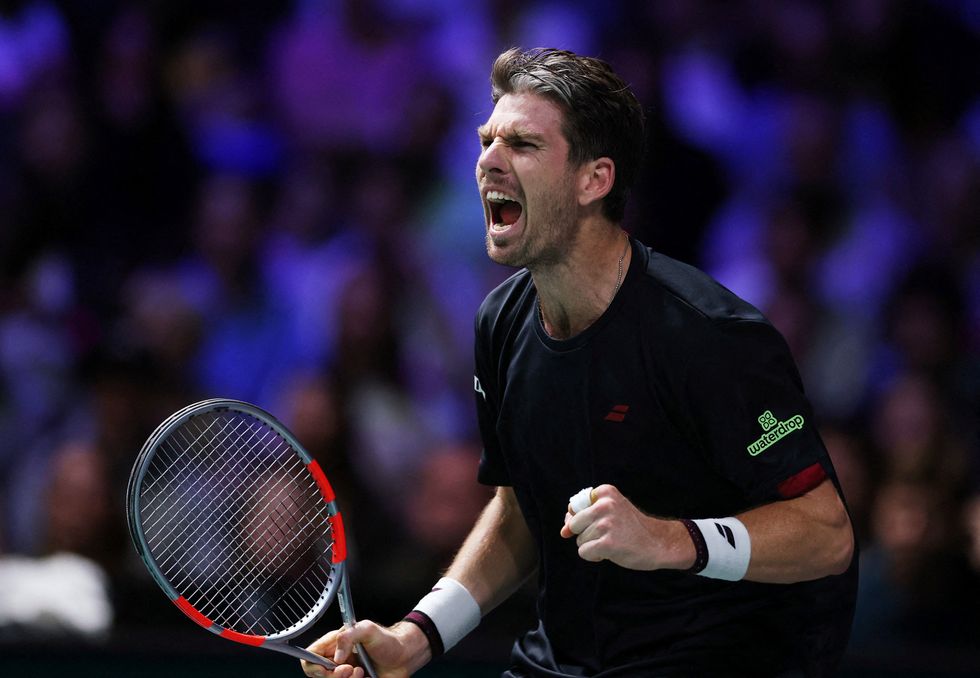 Cam Norrie celebrated a point wildly while the Paris crowd reacted with a chorus of boos
