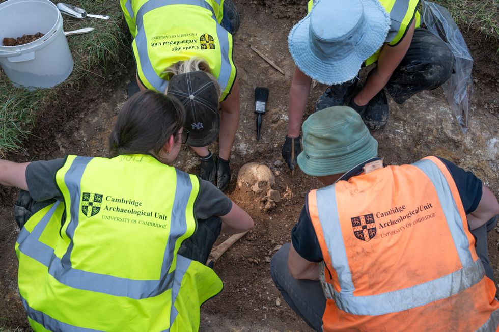 Cambridge University students discovering 10 bodies