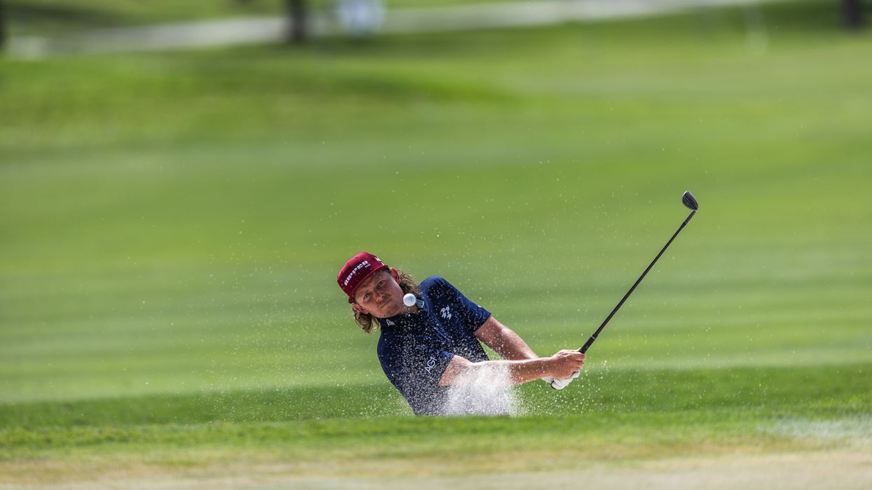 Cameron Tringale of HyFlyers GC hits from the bunker at the Tenth hole at Trump National Doral Miami on April 3
