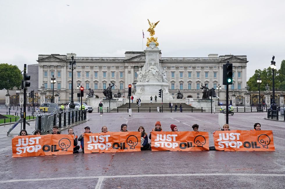Campaigners from Just Stop Oil during a protest on The Mall, near Buckingham Palace, London. Activists have been blocking roads in central London since the start of October as part of their campaign to stop future gas and oil projects from going ahead. Picture date: Monday October 10, 2022.