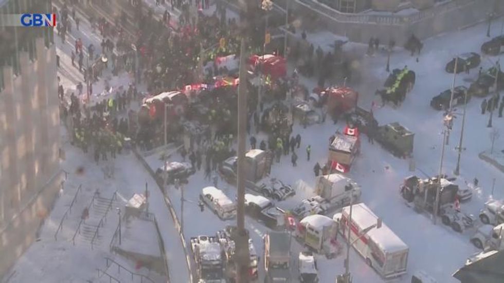 More than 100 people arrested as police clear out Ottawa protesters