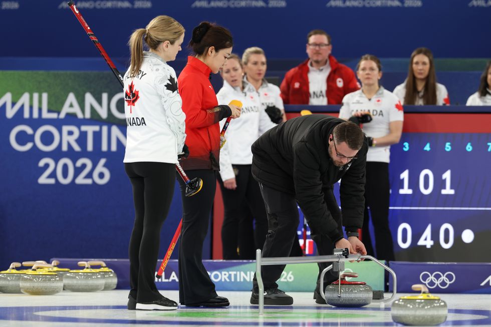 Canadian women's skip Rachel Homan had her stone removed after an official judged she had touched it following release