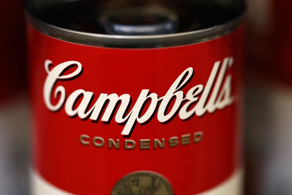 Cans of Campbell's soup are displayed on a shelf at Marinwood Market